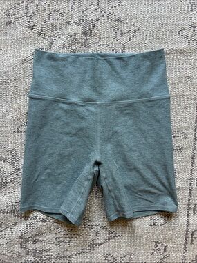 Vuori High-Rise Bike Shorts in Sage Green